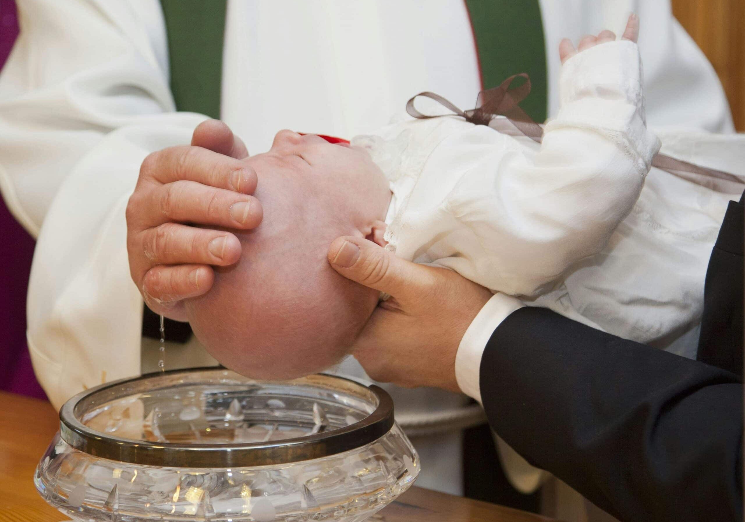 baby-getting-baptised-by-priest