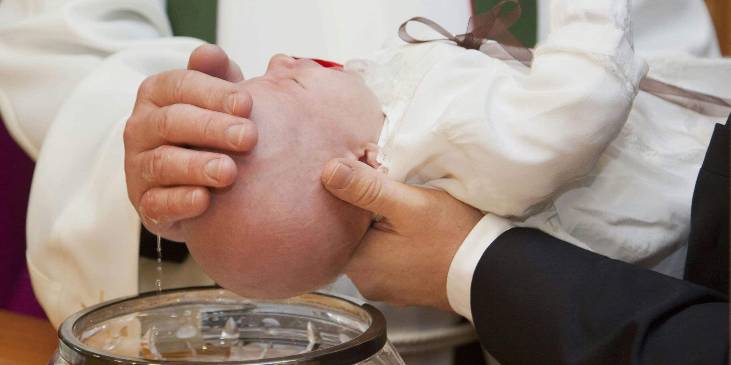 baby-getting-baptised-by-priest